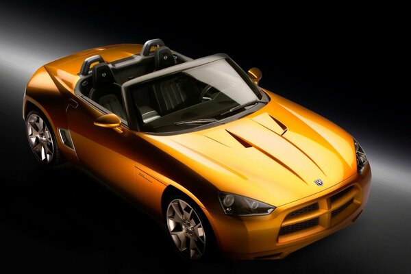 The concept of a yellow two-seater car