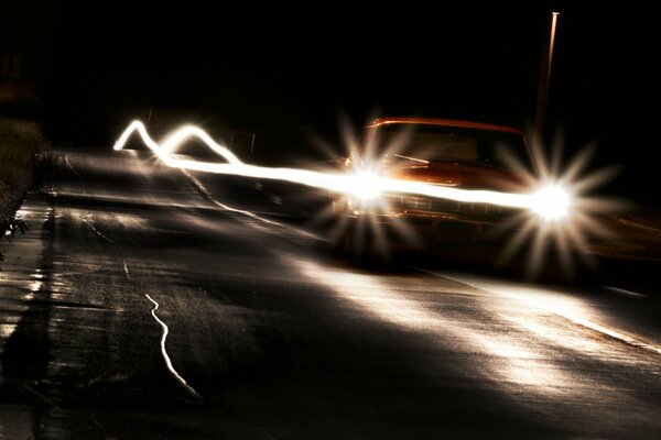 The car leaves a trail on the road