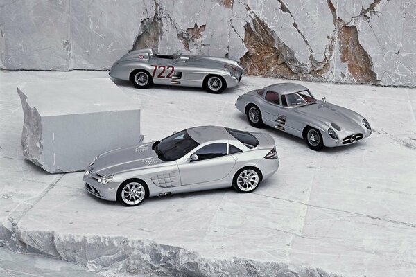 Mercedes models on a silver background