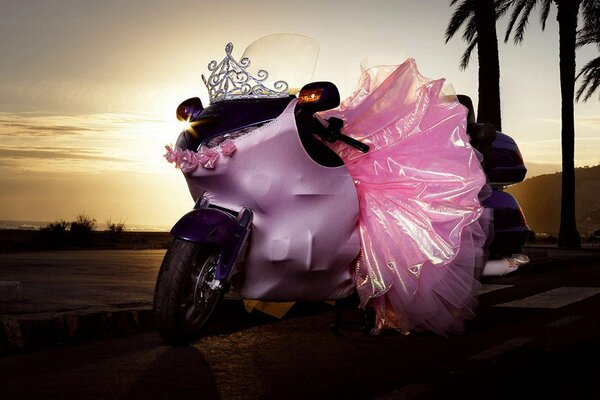 Wedding motorcycle at sunset pink