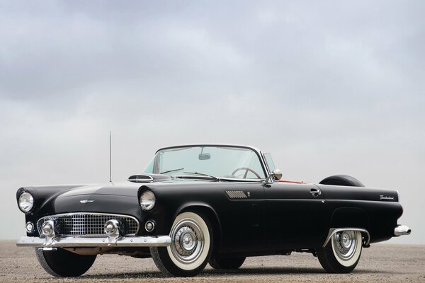 Retro car. Black Ford Thunderbird