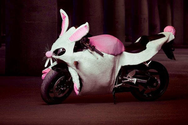 A white rabbit costume on a motorcycle