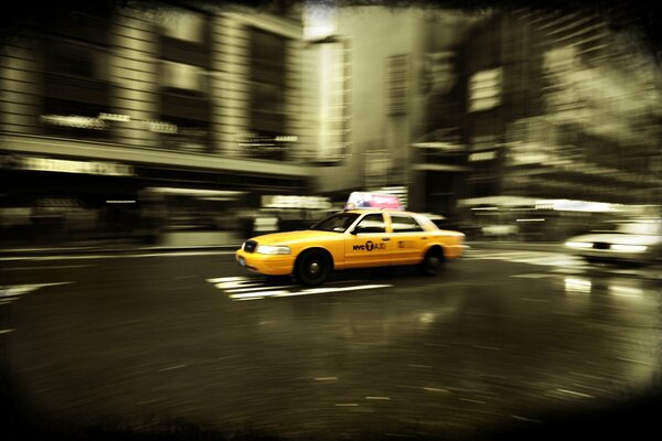 New York taxi rushes in the middle of the city