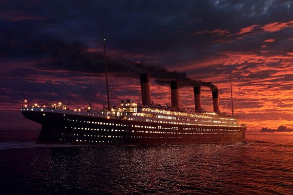 Titanic on the background of a red sunset