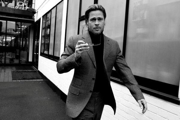 Black and white portrait of actor Brad Pitt in motion