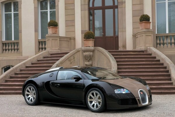 Bugatti veyron on the background of the house