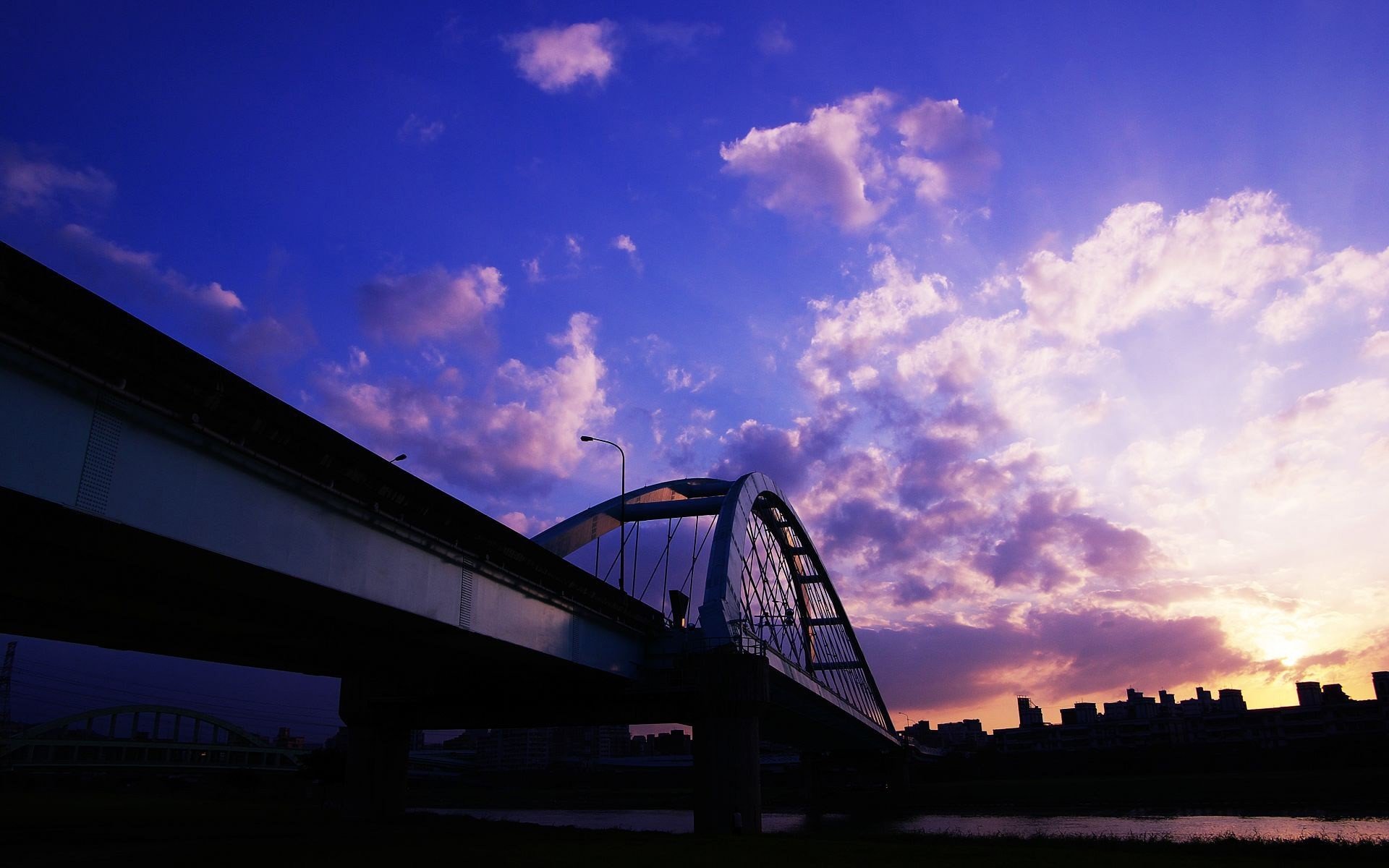 pont maisons nuages coucher de soleil