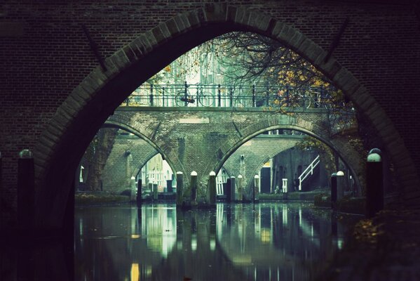 A look at the bridge in the reflection of the river