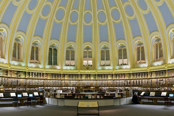 Panorama of a large library in golden tones