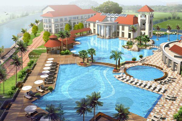 The hotel with a swimming pool and palm trees is beautiful