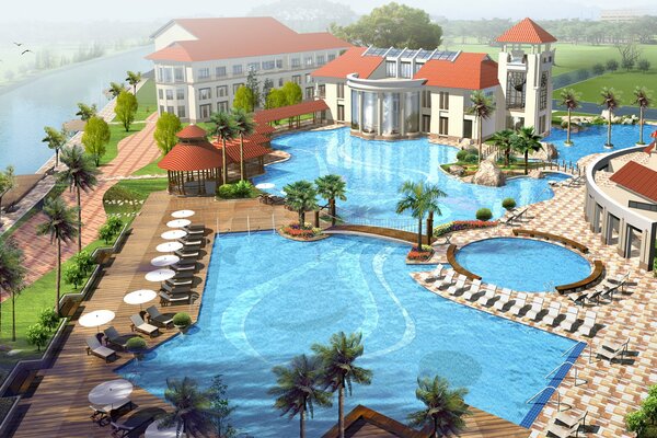 Отель с бассейном и пальмами красиво