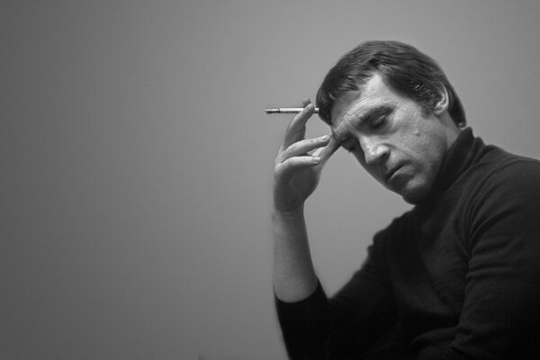 Thoughtful Vladimir Vysotsky with a cigarette