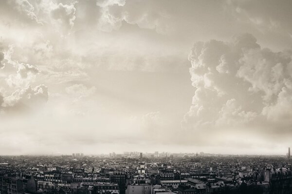 Clouds thicken over the panorama of the French capital