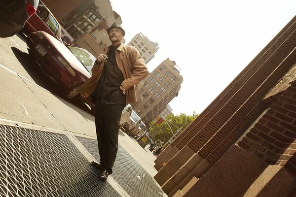 A man in a lunar tilt on a city street