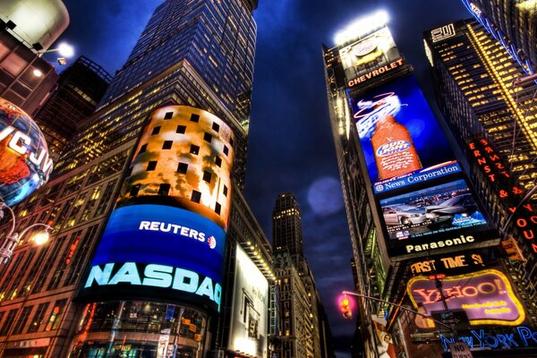 Neon advertising on high-rise buildings at night