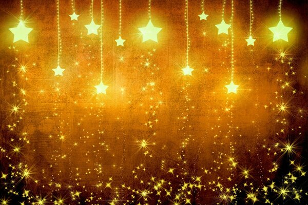 Shining yellow holiday stars on a brown background. Christmas decorations golden stars