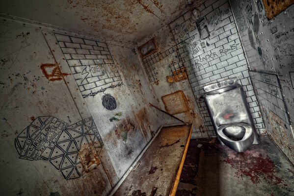 Dirty painted prison cell