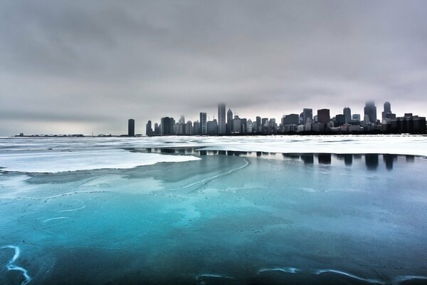 A city on the coast of the winter sea