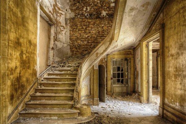 Beautiful staircase in an abandoned manor