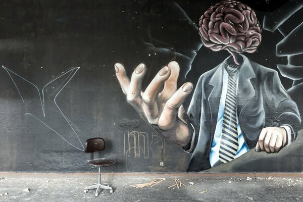 Graffiti of a man with a brain instead of a head