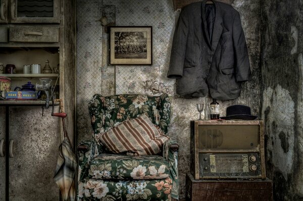 Antique interior with armchair and radio