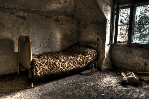 An old bed in an empty house