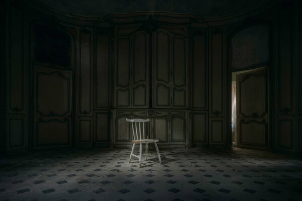 Dark room hall with a chair