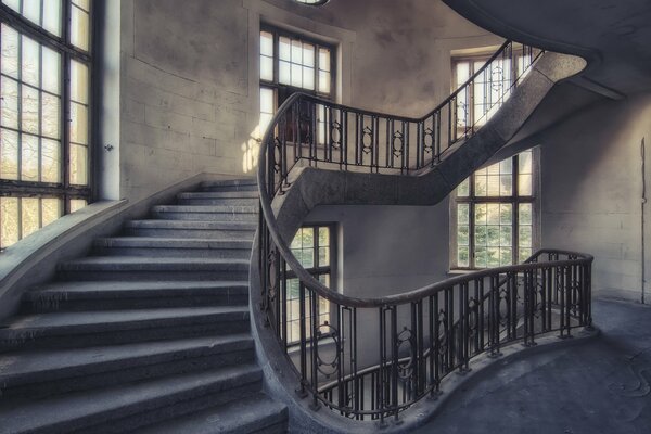 Wide staircase with large windows