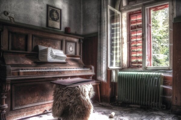 The piano is near the window