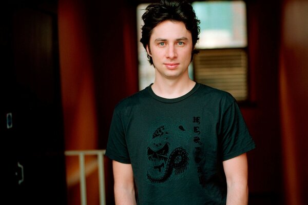 Famous actor Zach Braff is standing