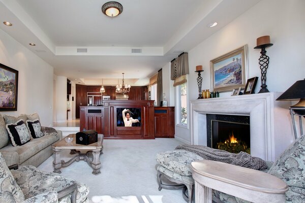 Photo interior with fireplace and TV