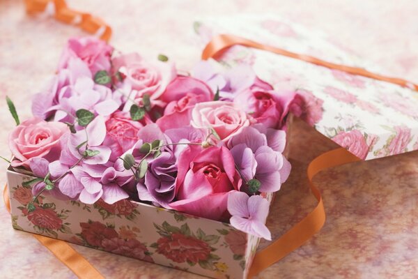 Pink flowers in a gift box