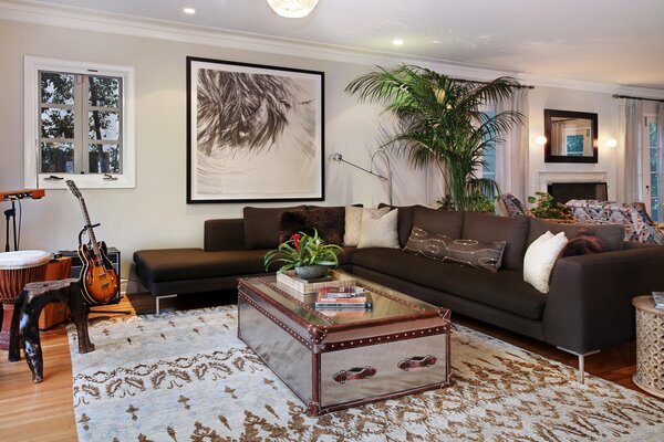 Photo of the design of the living room with a large sofa