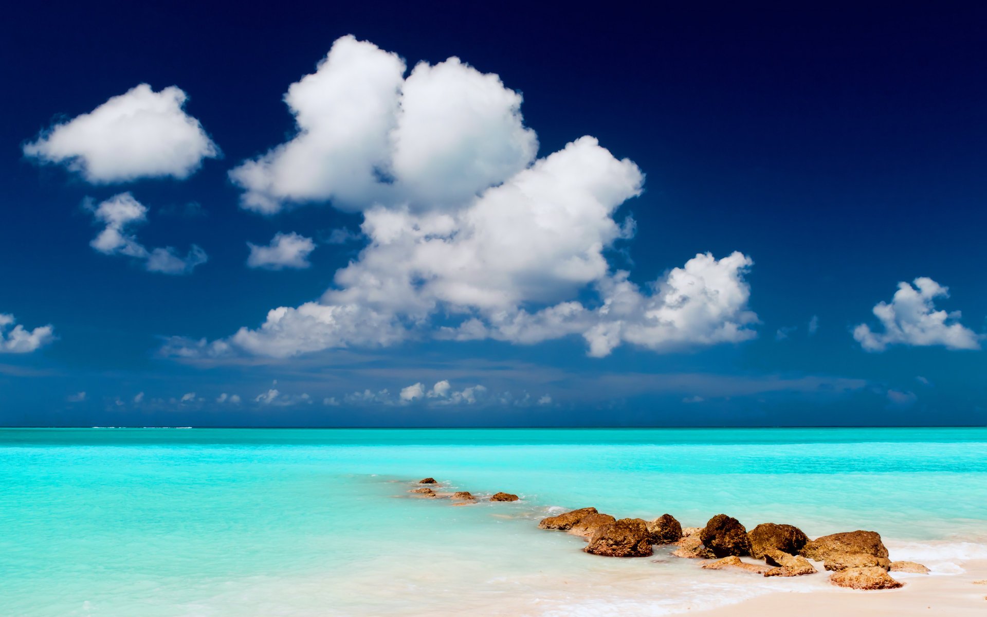 landscape water stones beach the sky clouds sand sea