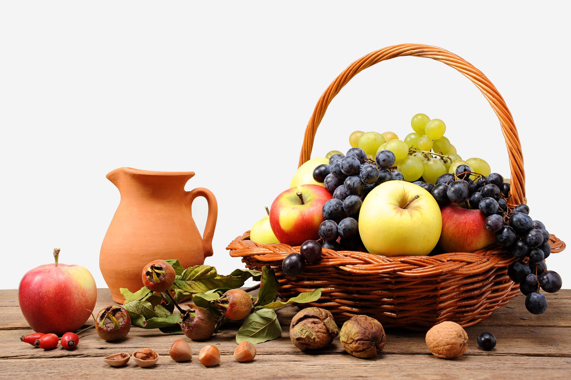 basket fruit apples nuts pitcher grape