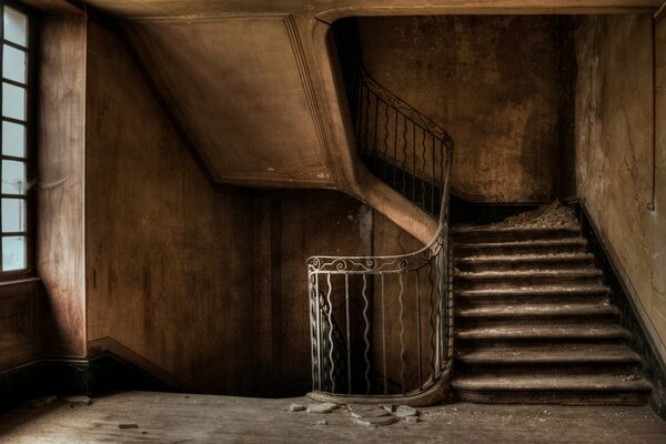 Vintage staircase in a dilapidated interior