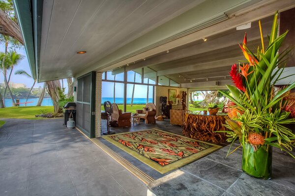 A house in Hawaii on the background of the ocean