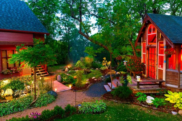 Beautiful garden interior with lights on the paths