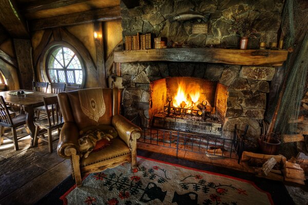 Cozy interior, fireplace and armchair