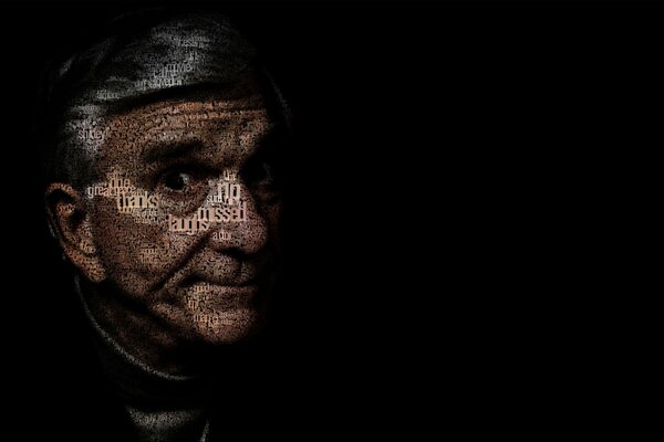 Actor Leslie Nielsen on a black background