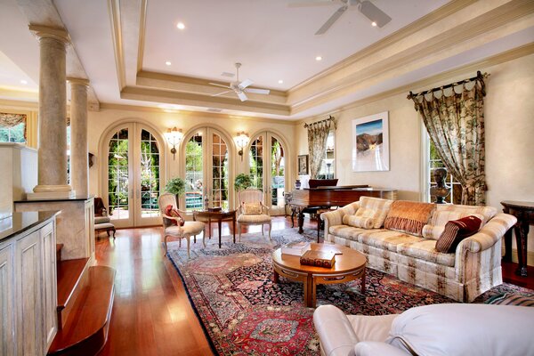 The interior of the living room in a mansion with luxurious furniture