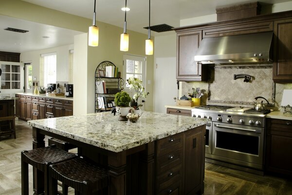 Kitchen design with island and modern lamps