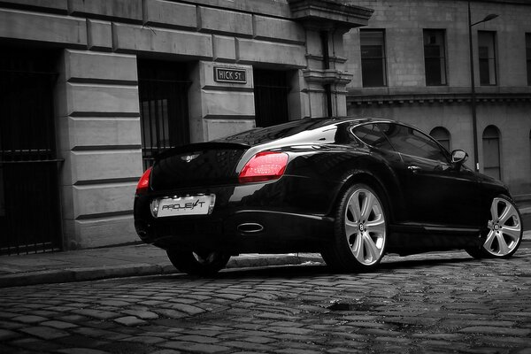 Beautiful black car on the city street