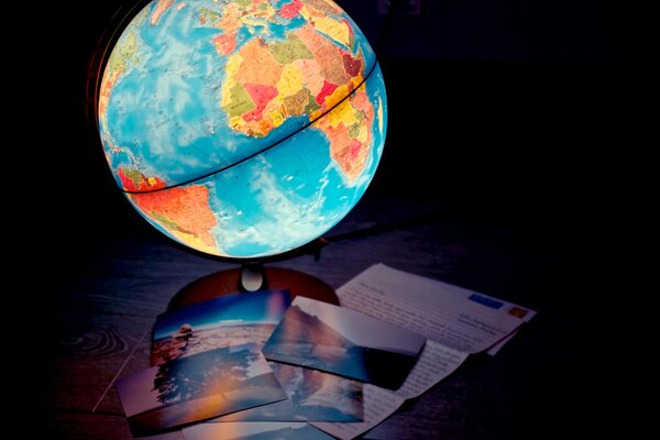 Illuminated political Globe and travel photos