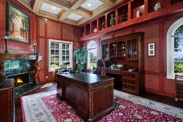 Classic study with fireplace and wooden furniture