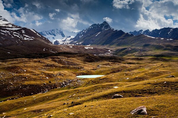 Beautiful mountains in Kyrgyzstan , clouds