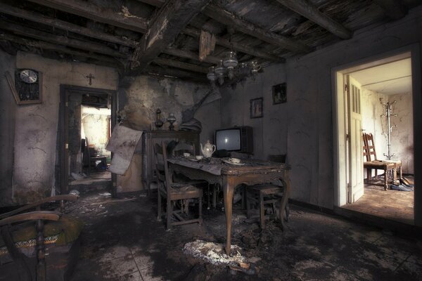 An uncomfortable room with an old TV