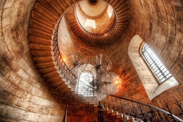 Tower with staircase with spiral chandelier