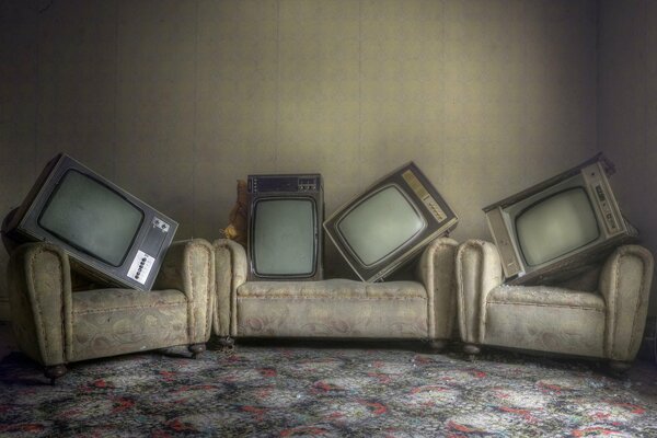 The image of old TVs on the background of the interior