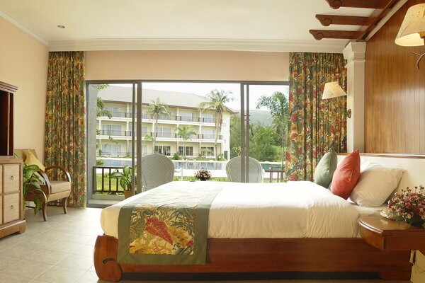 Interior of a bedroom decorated with wood